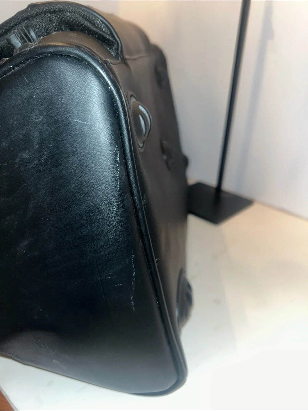 Tumi Black Duffel Bag with Red Logo Accent